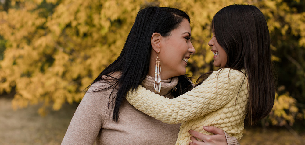 smiling portrait of woman and child by Tanille K Campbell